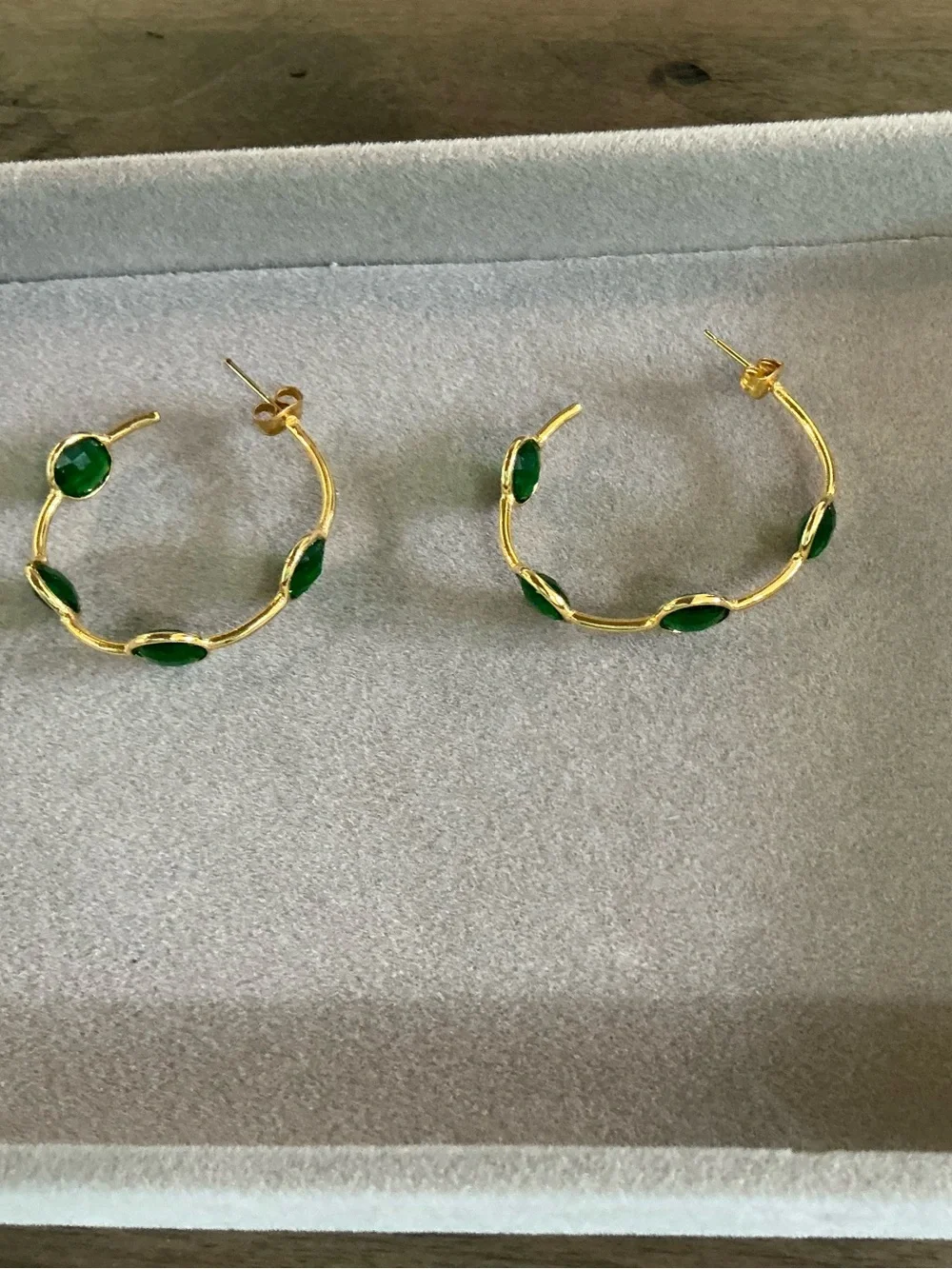 Gold Hoop Earrings with Green Stone Accents